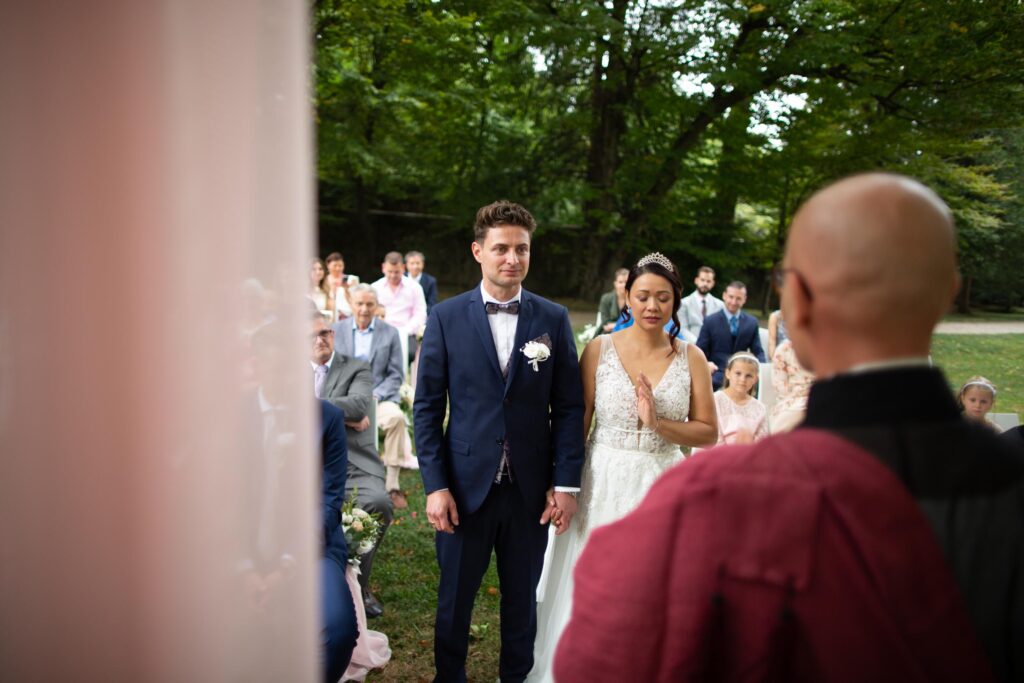 Wedding ceremony in italy with abbot reding from switzerland