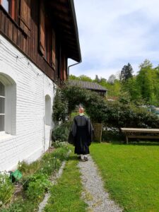 Zen monk abbot reding as a funeral celebrant